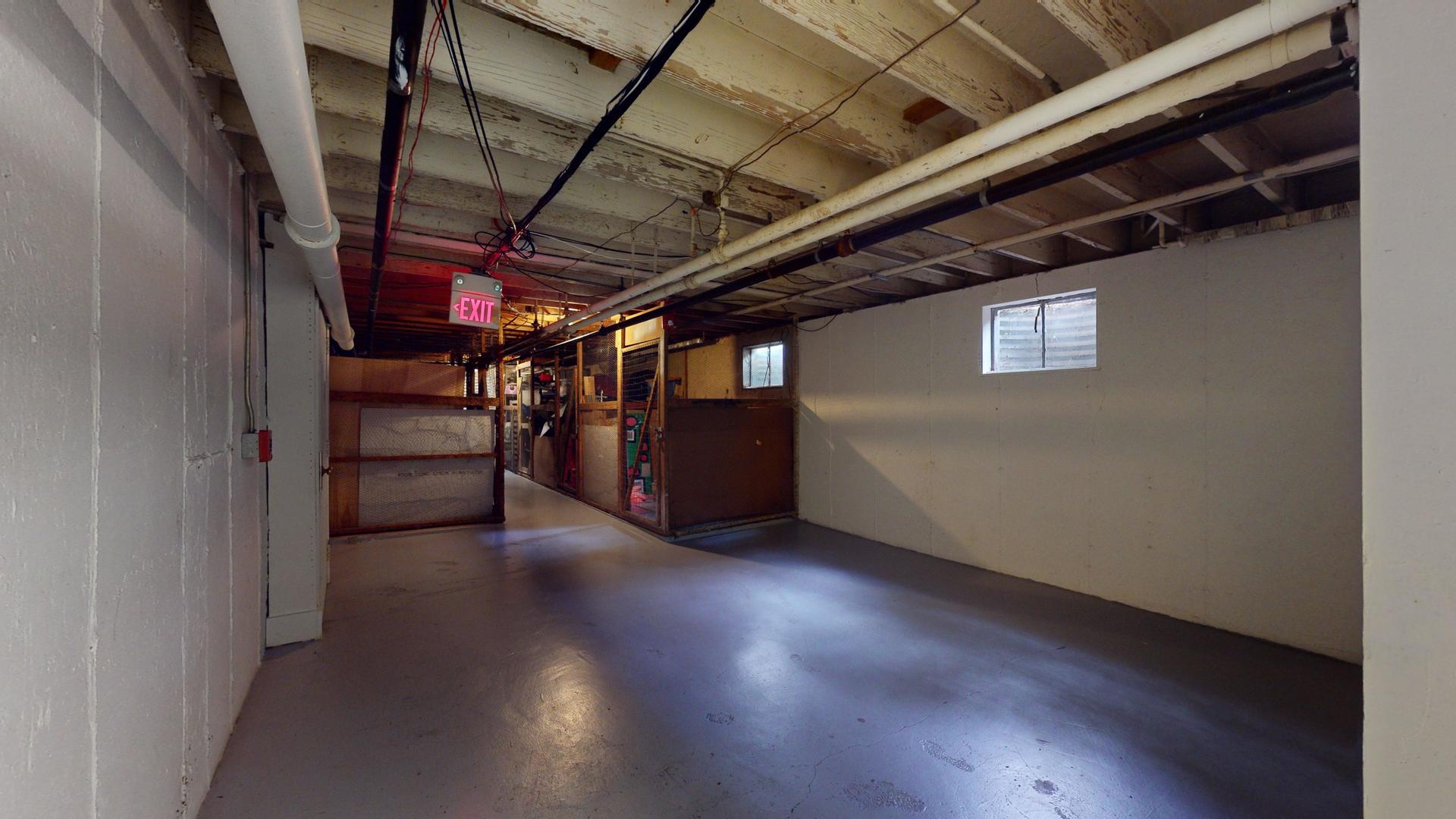 2302 West Algonquin Road, Unit 12 Rolling Meadows, IL 60008 - Photo 17 of 22 a view of an empty room with wooden floor