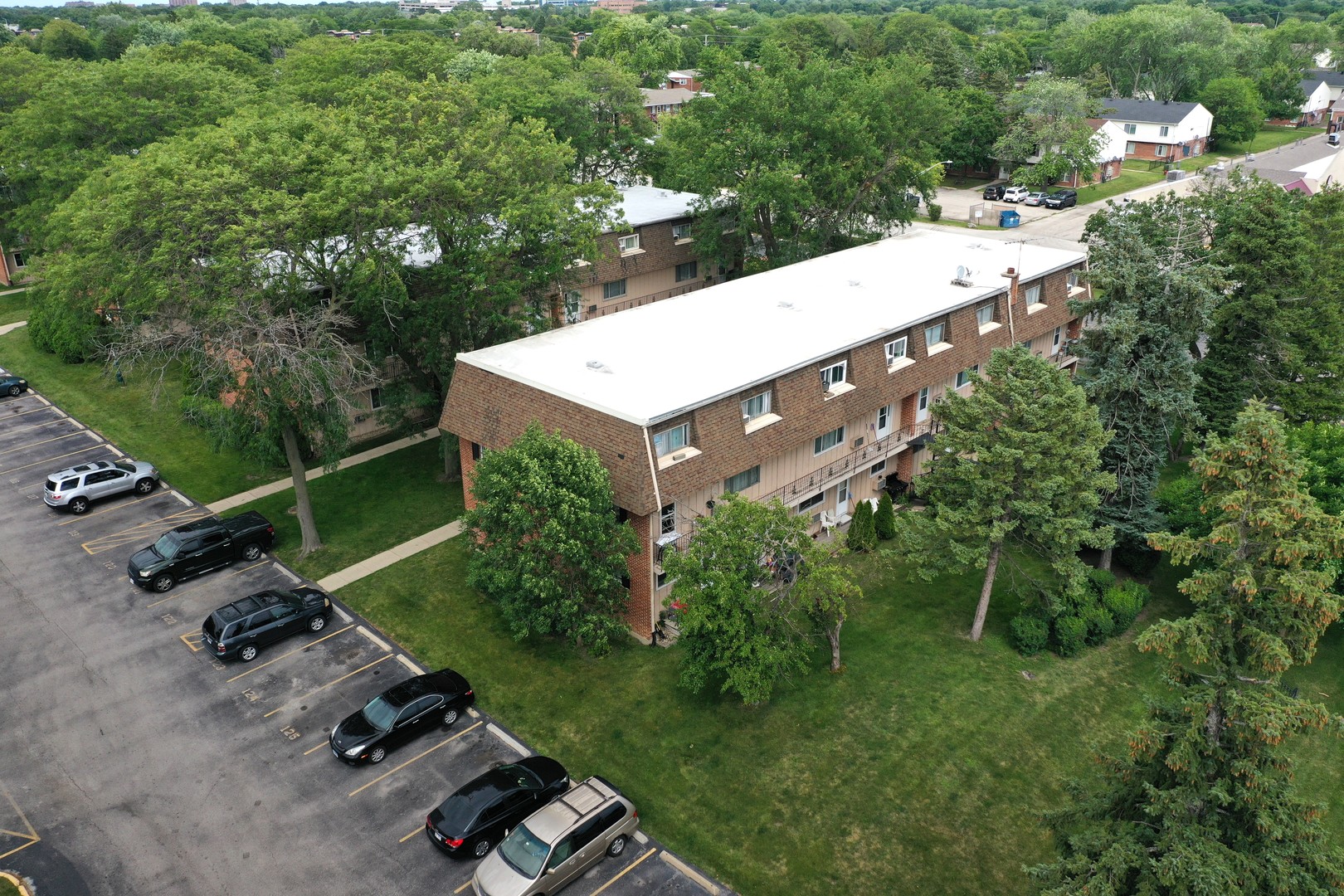 2302 West Algonquin Road, Unit 12 Rolling Meadows, IL 60008 - Photo 19 of 22 a view of a backyard