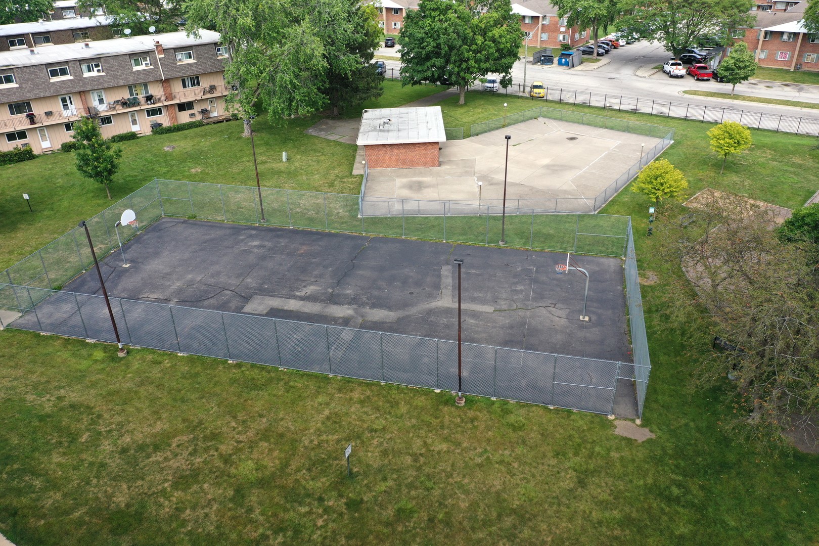 2302 West Algonquin Road, Unit 12 Rolling Meadows, IL 60008 - Photo 20 of 22 a view of a backyard with sitting area