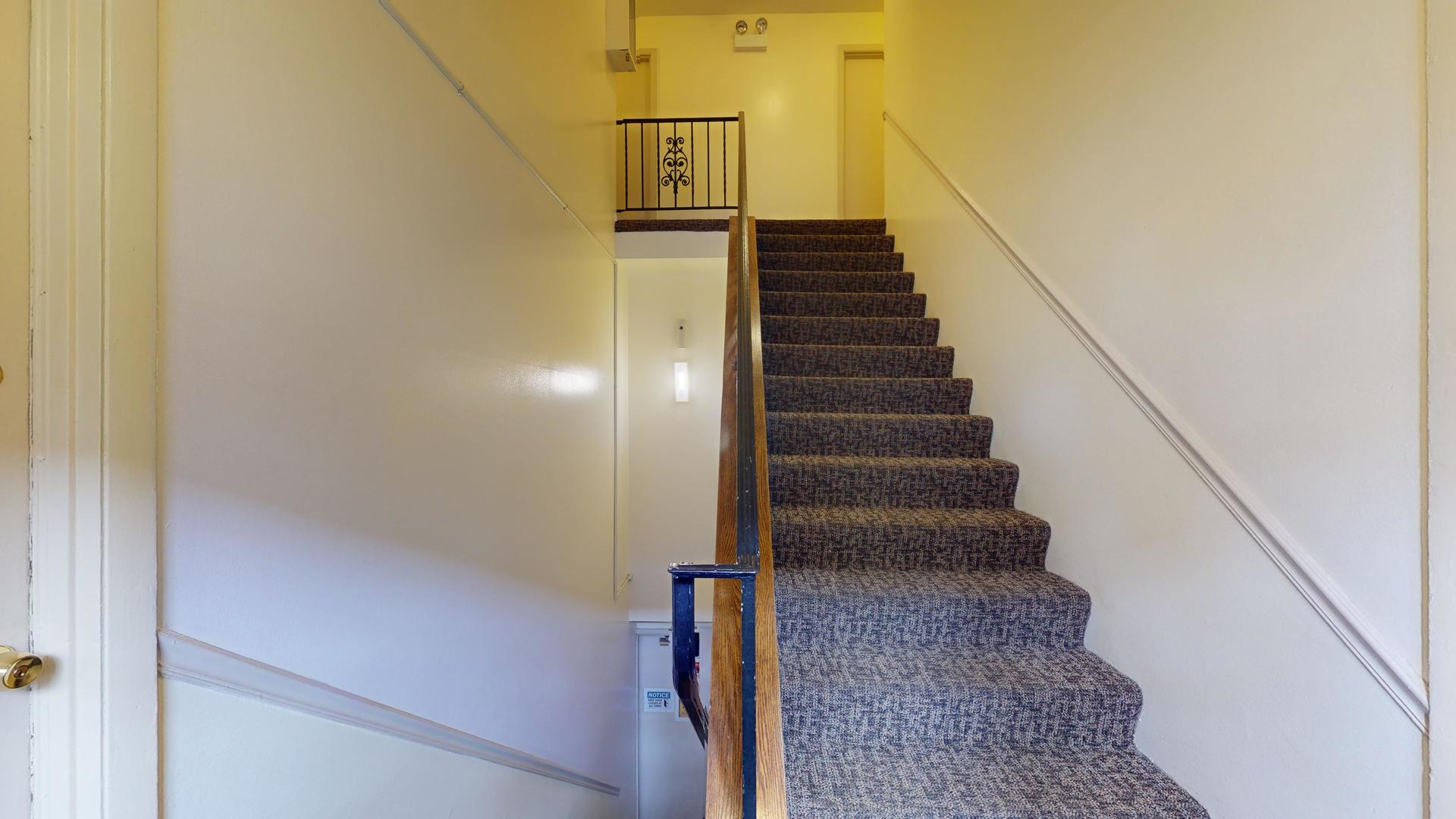 2302 West Algonquin Road, Unit 12 Rolling Meadows, IL 60008 - Photo 3 of 22 a view of entryway and hall with wooden floor