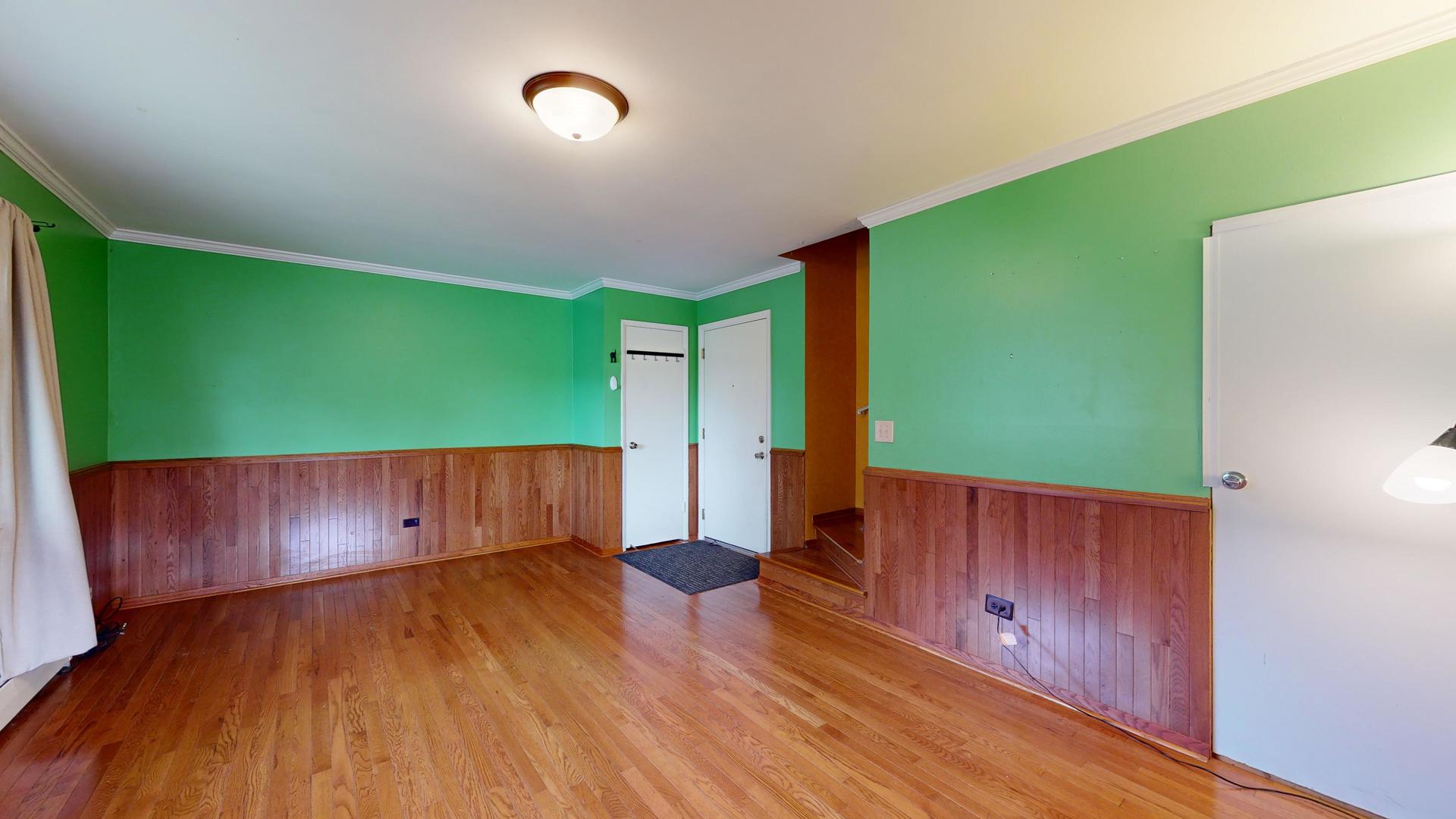 2302 West Algonquin Road, Unit 12 Rolling Meadows, IL 60008 - Photo 8 of 22 a view of room with wooden floor