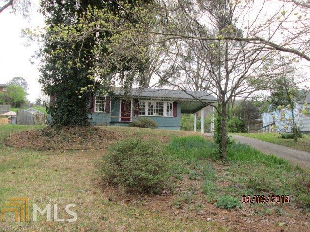 2719 Maple Road Southeast Rome, GA 30161 - Photo 1 of 1 a view of a yard in front of house