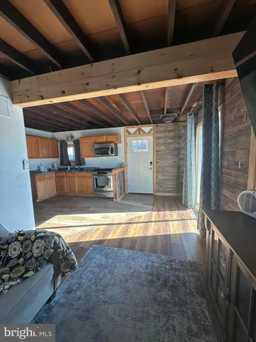 a view of a room with wooden cabinets