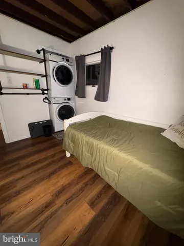 a bedroom with a bed and a cabinets