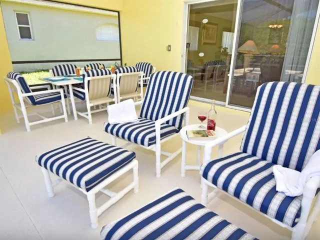 a bedroom with two beds and a dresser