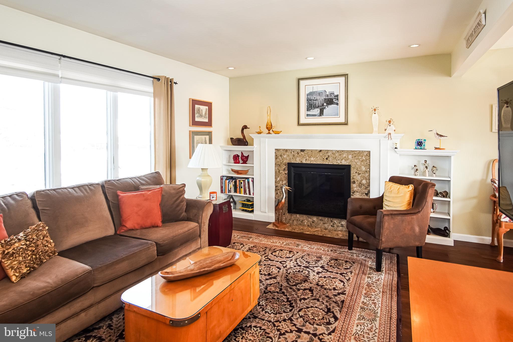 35 Walkill Road Tuckerton, NJ 08087 - Photo 13 of 42 a living room with furniture and a fireplace