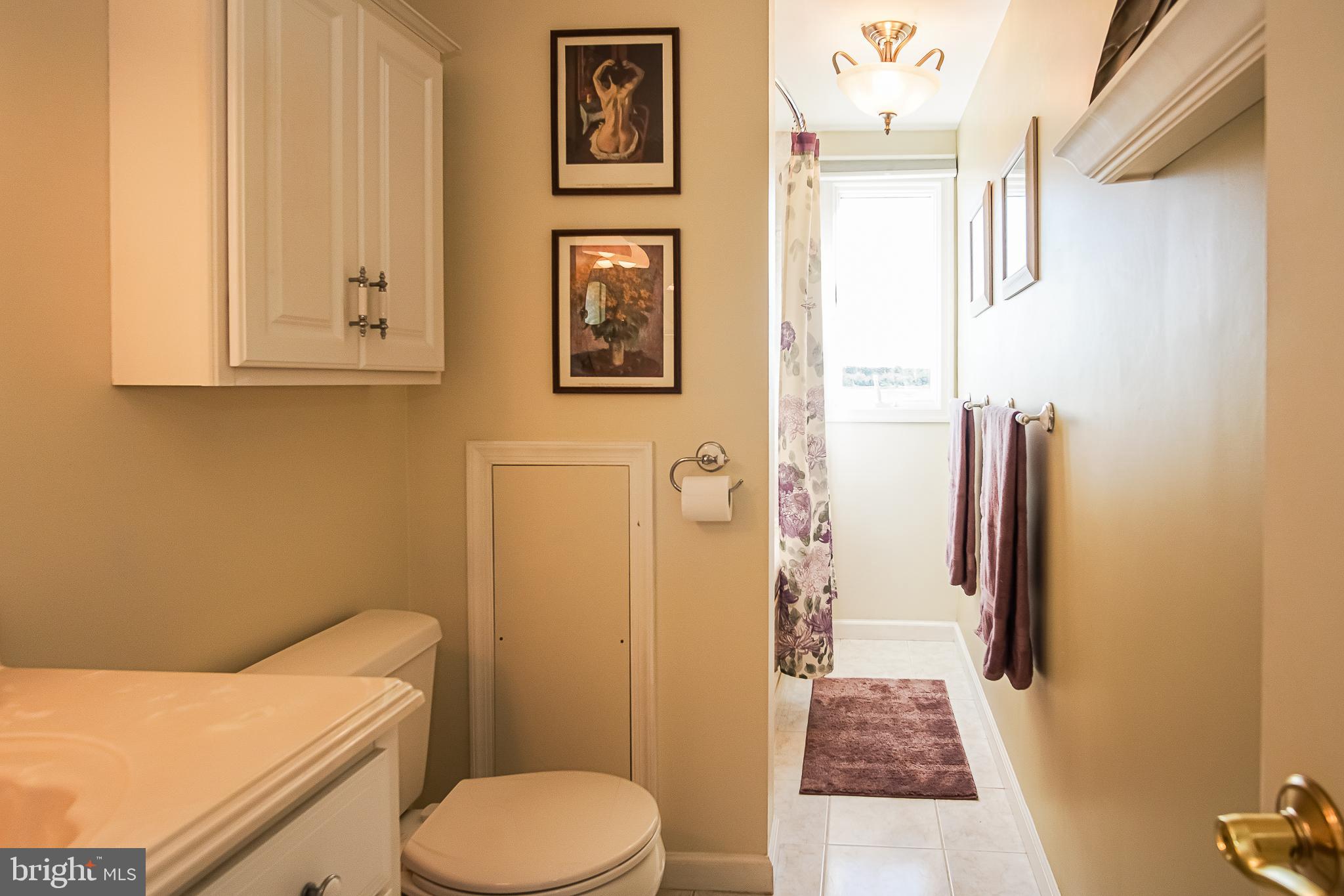 35 Walkill Road Tuckerton, NJ 08087 - Photo 18 of 42 a bathroom with a sink toilet and shower