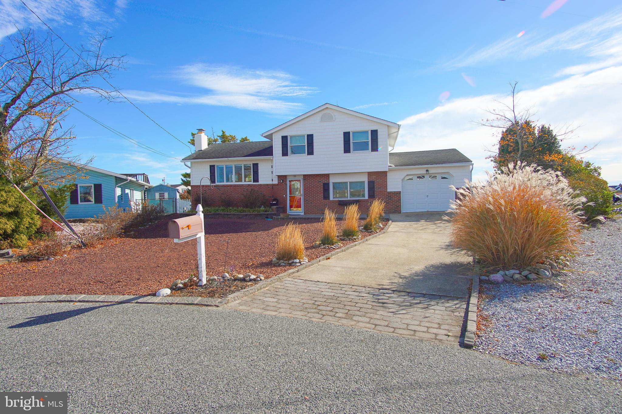 35 Walkill Road Tuckerton, NJ 08087 - Photo 22 of 42 a front view of a house with a yard