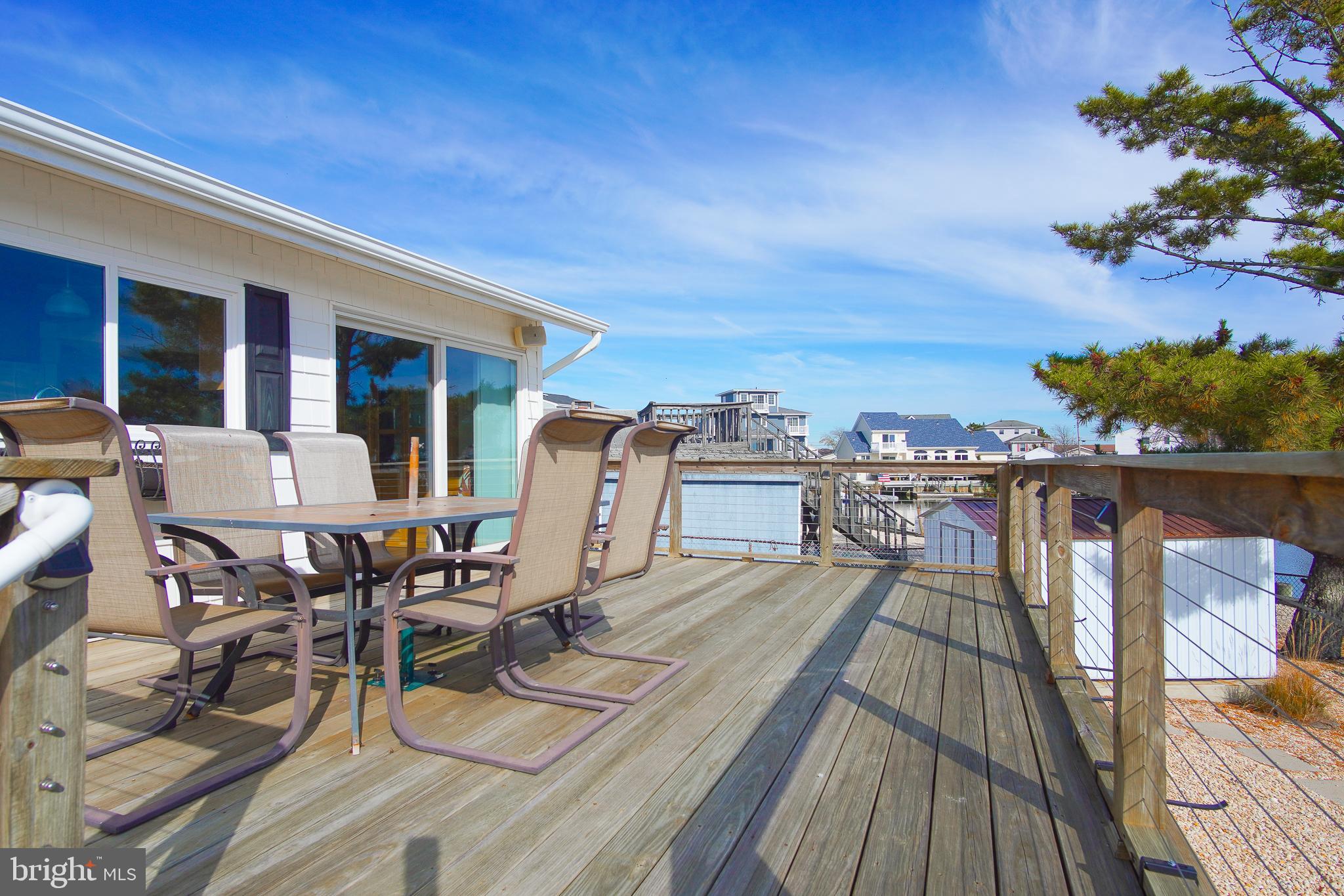 35 Walkill Road Tuckerton, NJ 08087 - Photo 28 of 42 a view of a roof deck with table and chairs