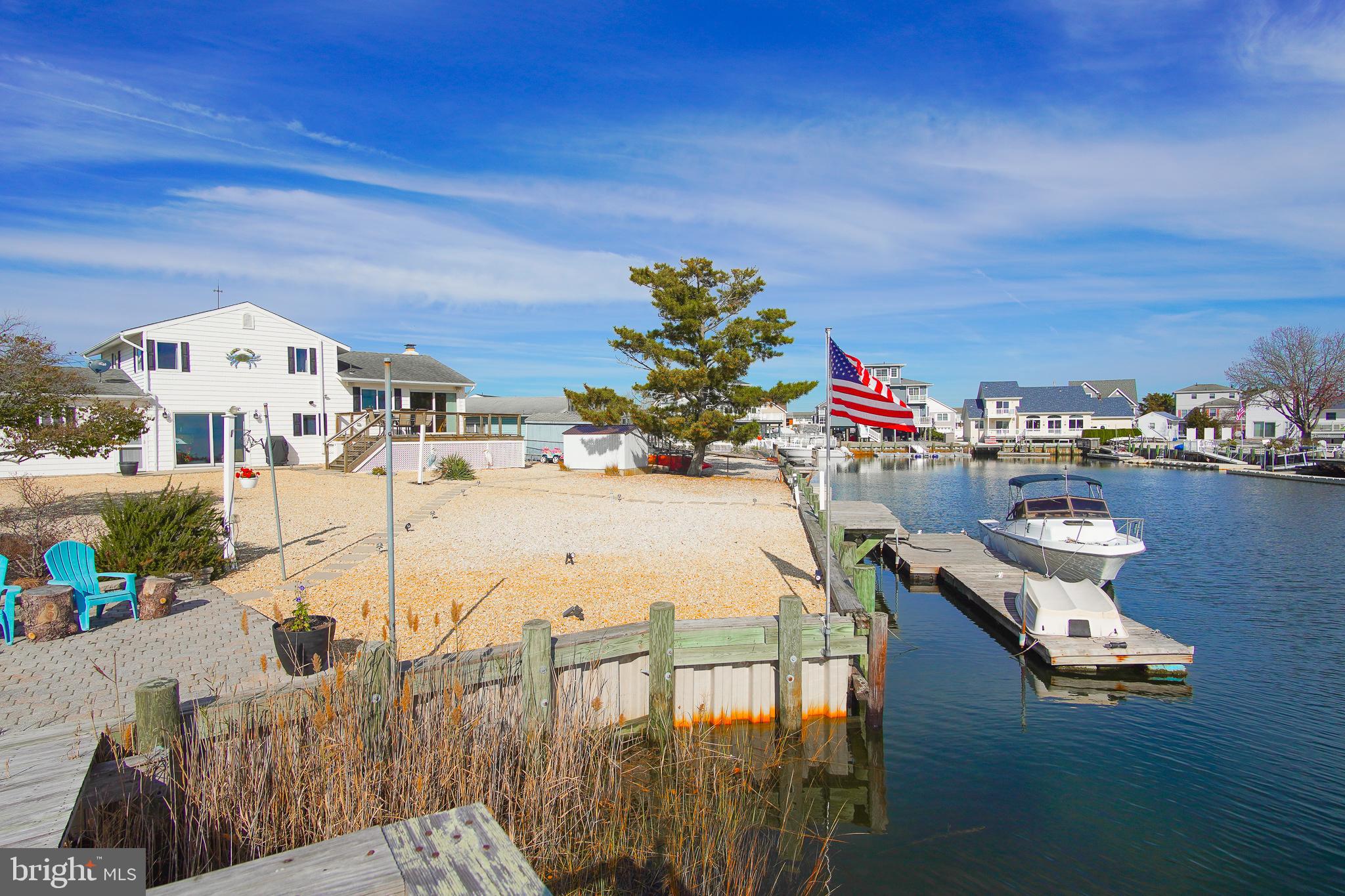 35 Walkill Road Tuckerton, NJ 08087 - Photo 35 of 42 a view of a balcony with chairs and umbrella