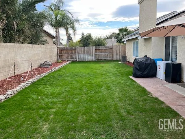 a view of a backyard with a garden