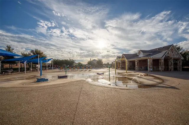 a view of yard with patio