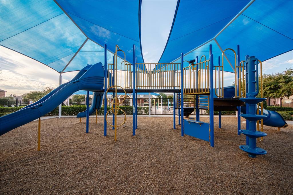 5016 Pacific Way Frisco, TX 75036 - Photo 23 of 24 a view of yard with a slide