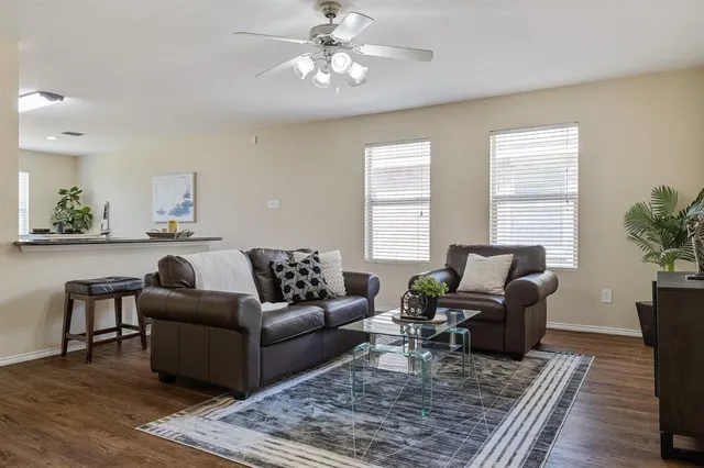 a living room with furniture and a couch