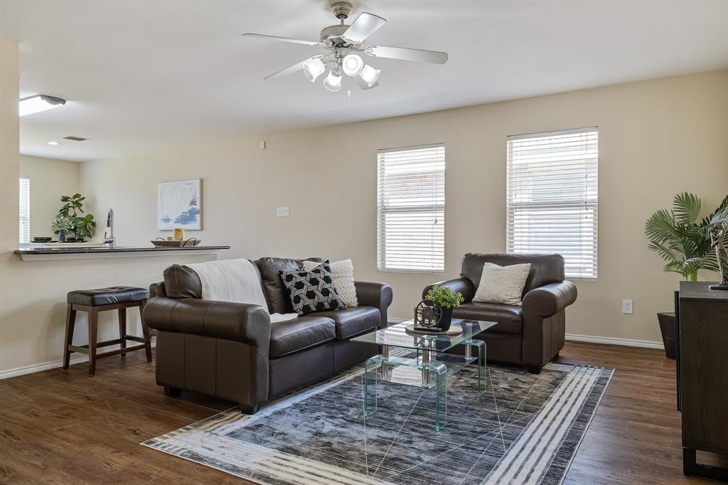 5016 Pacific Way Frisco, TX 75036 - Photo 4 of 24 a living room with furniture and a couch