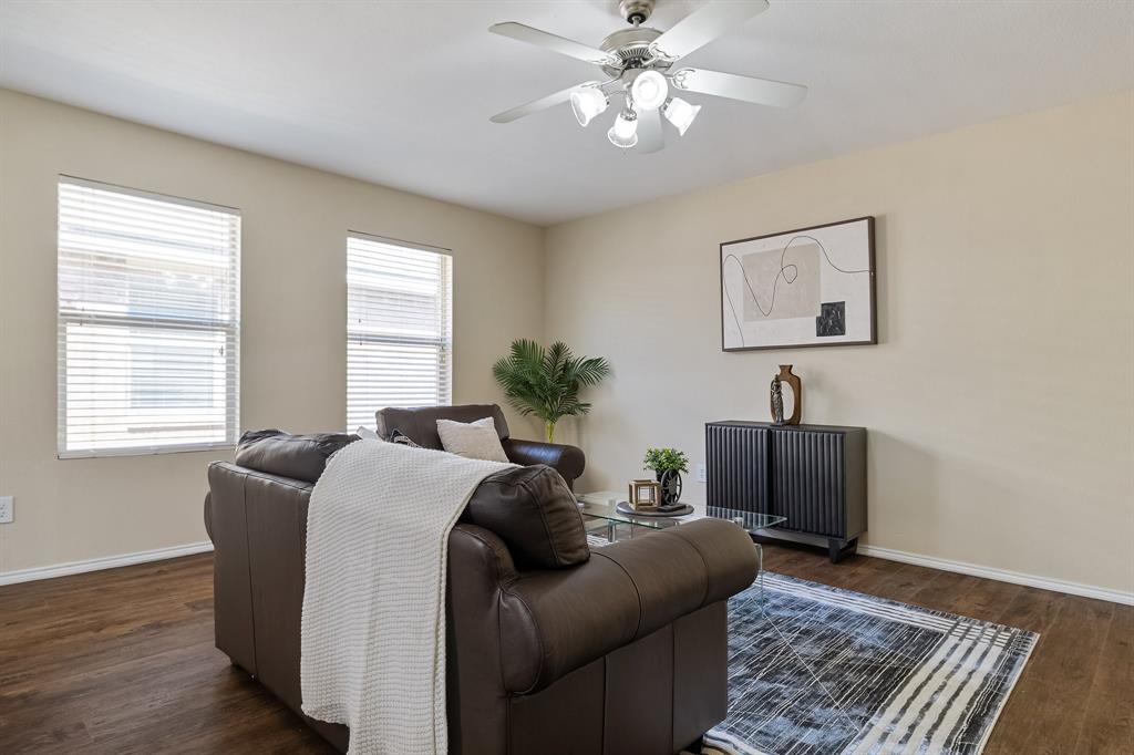 5016 Pacific Way Frisco, TX 75036 - Photo 5 of 24 a living room with furniture and a window