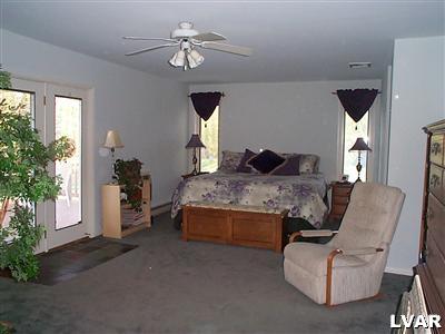 4090 Jacksonville Road Bethlehem, PA 18017 - Photo 11 of 16 Master bedroom with atrium doors leading to deck.