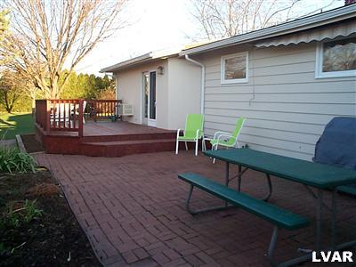 4090 Jacksonville Road Bethlehem, PA 18017 - Photo 2 of 16 brick paver patio and wooden deck