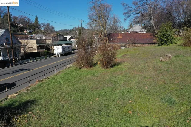 a view of a town with barn house