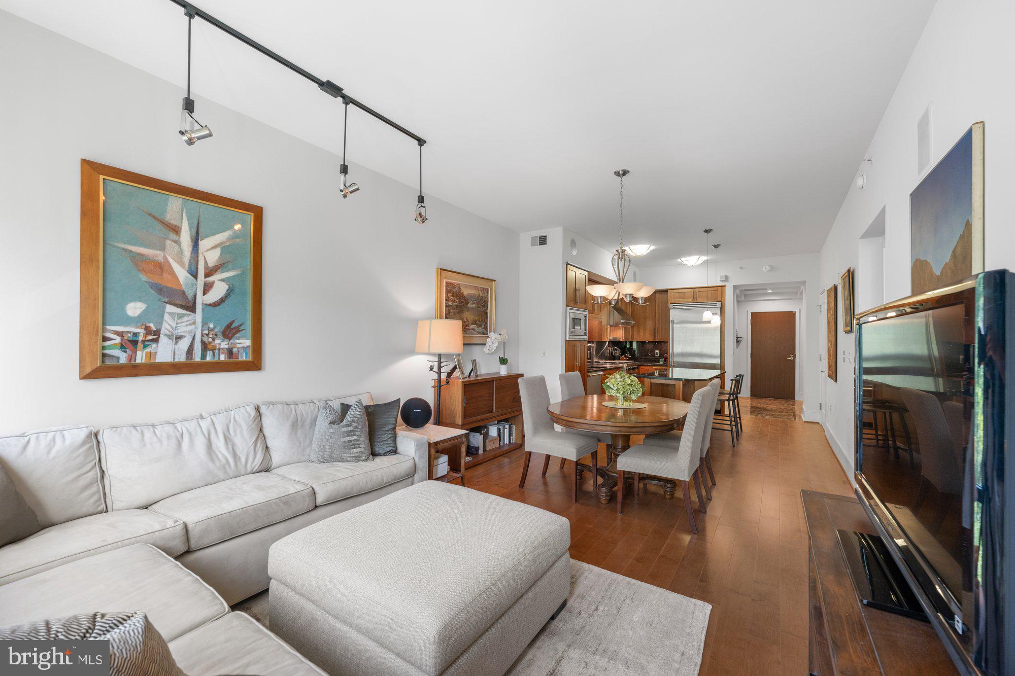 4301 Military Road Northwest, Unit 413 Washington, DC 20015 - Photo 11 of 24 Easy flow between living, dining and kitchen