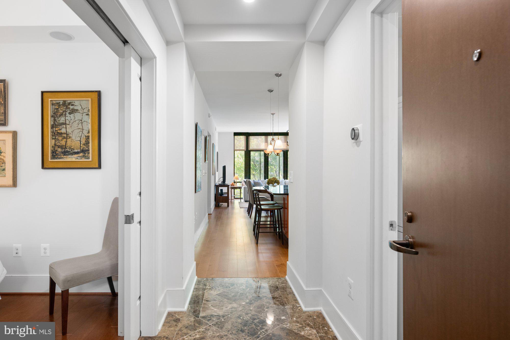 4301 Military Road Northwest, Unit 413 Washington, DC 20015 - Photo 5 of 24 Welcome to unit #413. Gleaming wood floors.