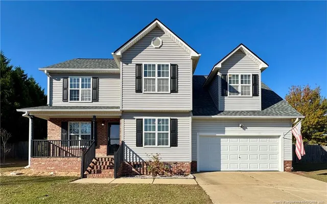 front view of house with a yard