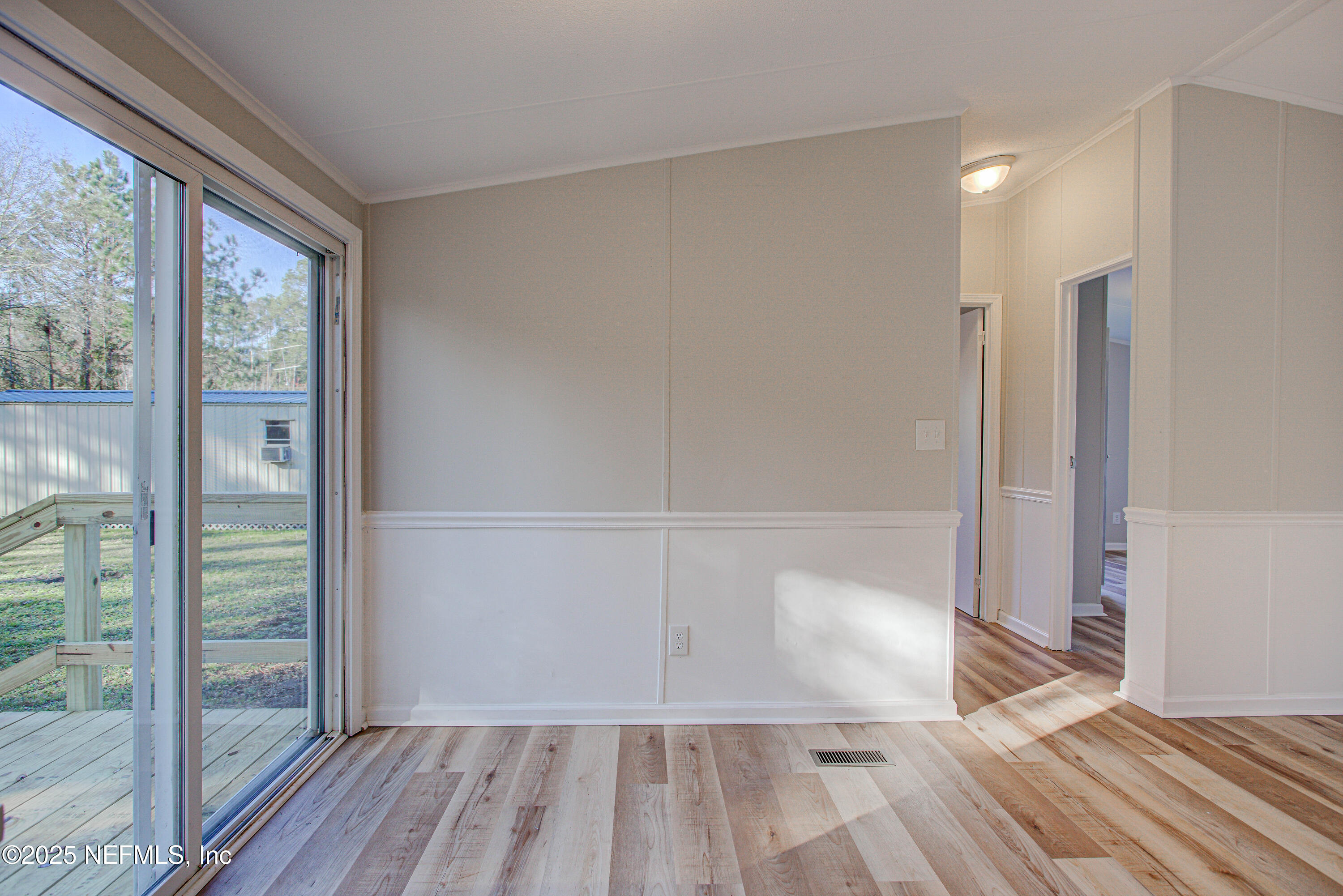 5175 Carter Spencer Road Middleburg, FL 32068 - Photo 12 of 41 a view of a room with wooden floor and balcony