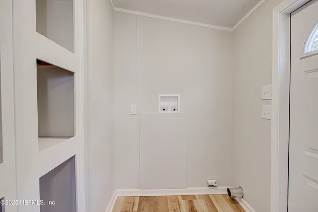 a living room with a couch and a flat screen tv