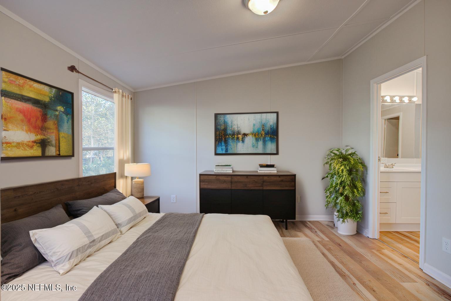 5175 Carter Spencer Road Middleburg, FL 32068 - Photo 15 of 41 a living room with a couch and a flat screen tv