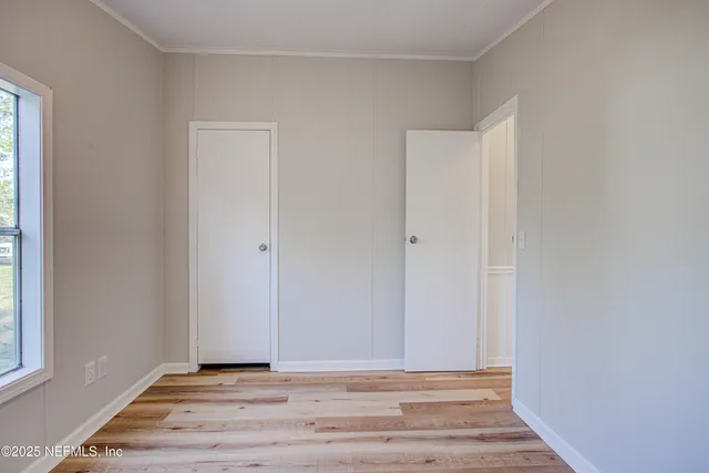 a view of a house with basketball court