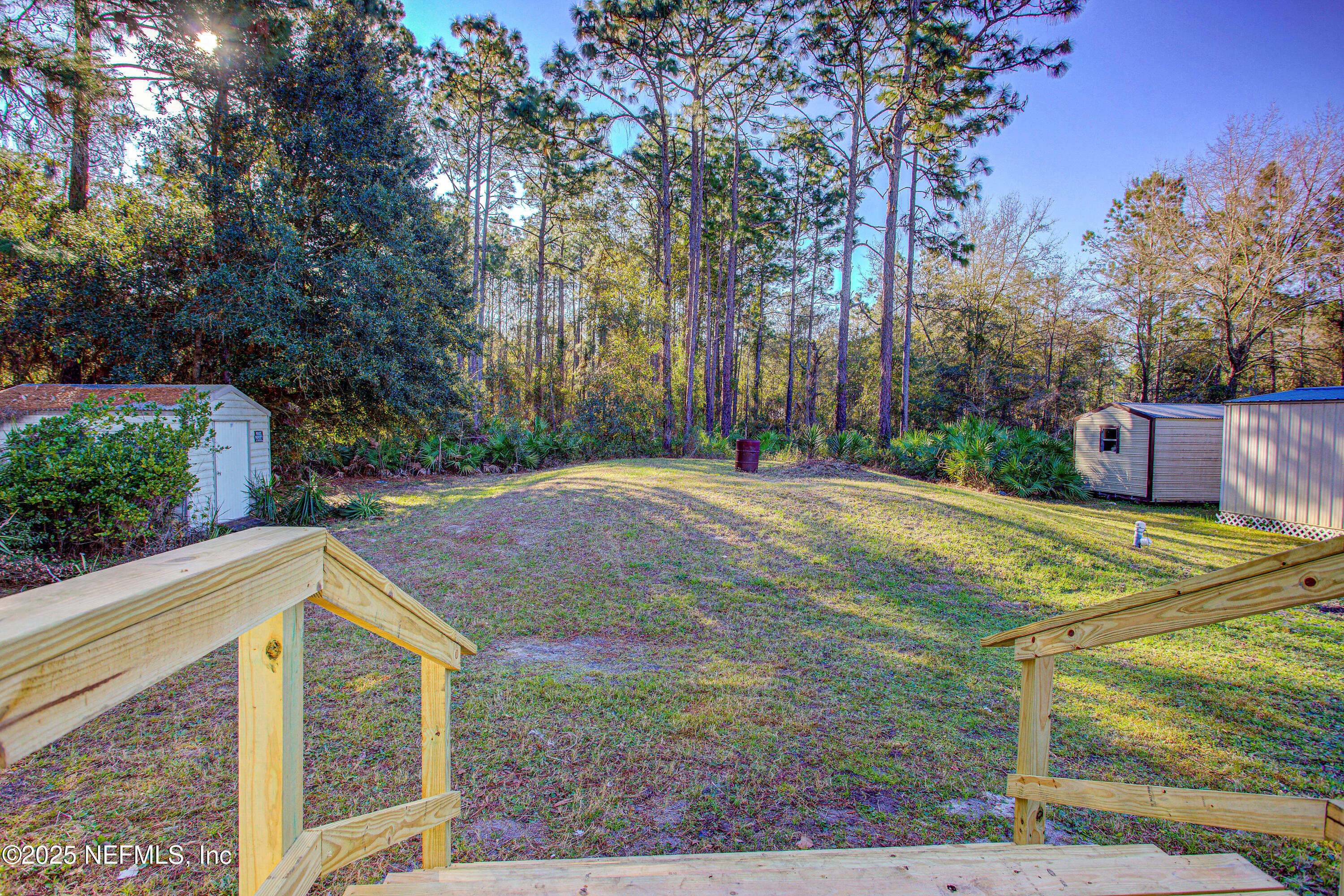 5175 Carter Spencer Road Middleburg, FL 32068 - Photo 26 of 41 a view of a house with basketball court