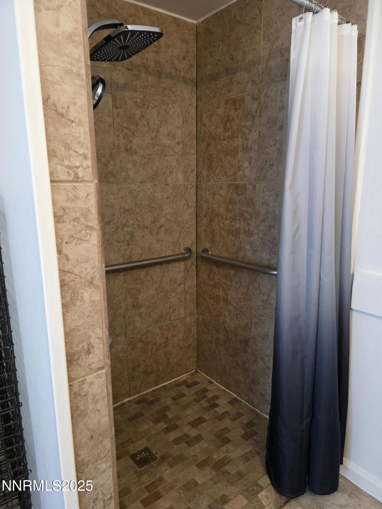 1110 4th Street Hawthorne, NV 89415 - Photo 20 of 27 a bathroom with a shower