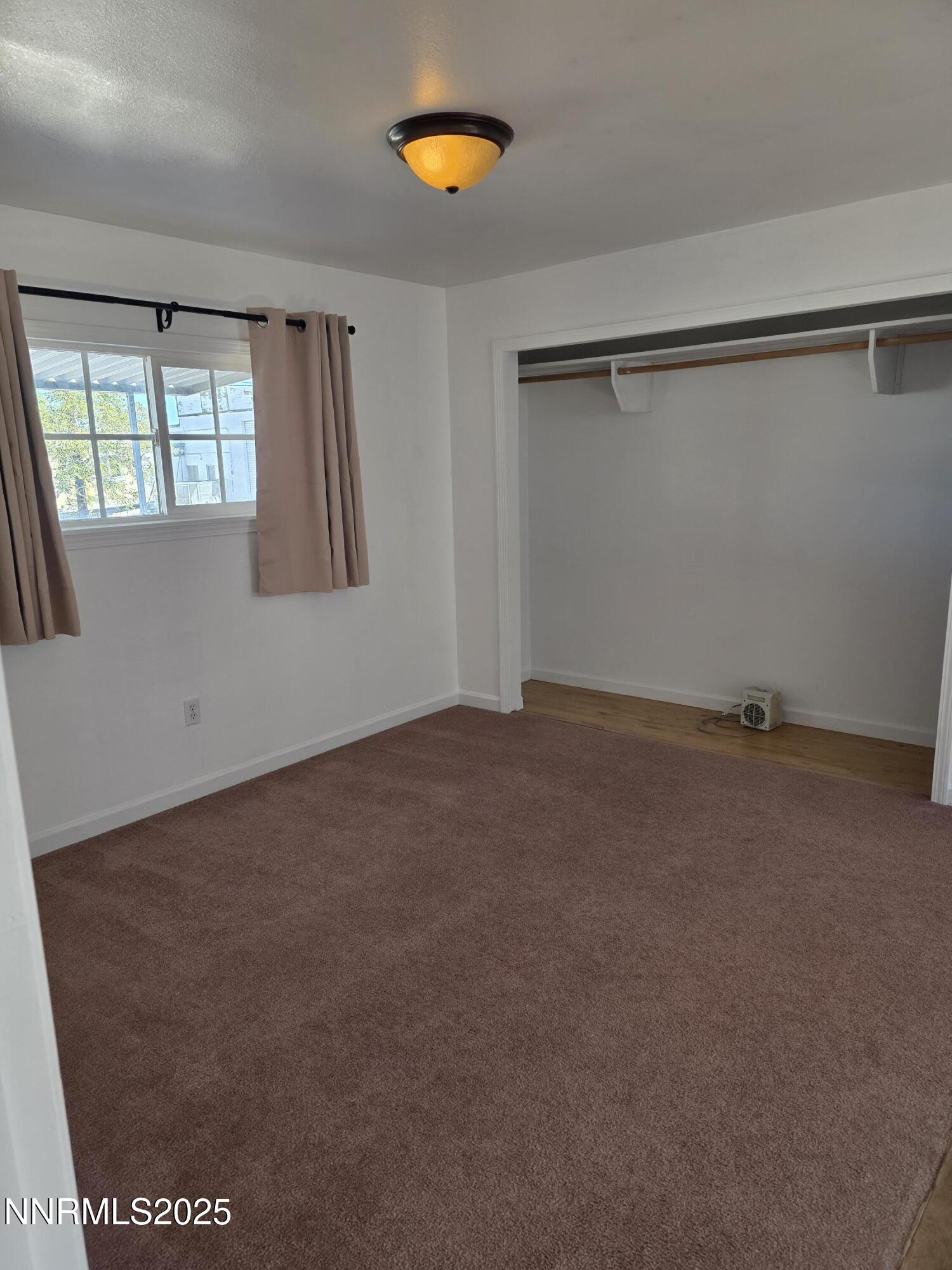 1110 4th Street Hawthorne, NV 89415 - Photo 23 of 27 an empty room with windows
