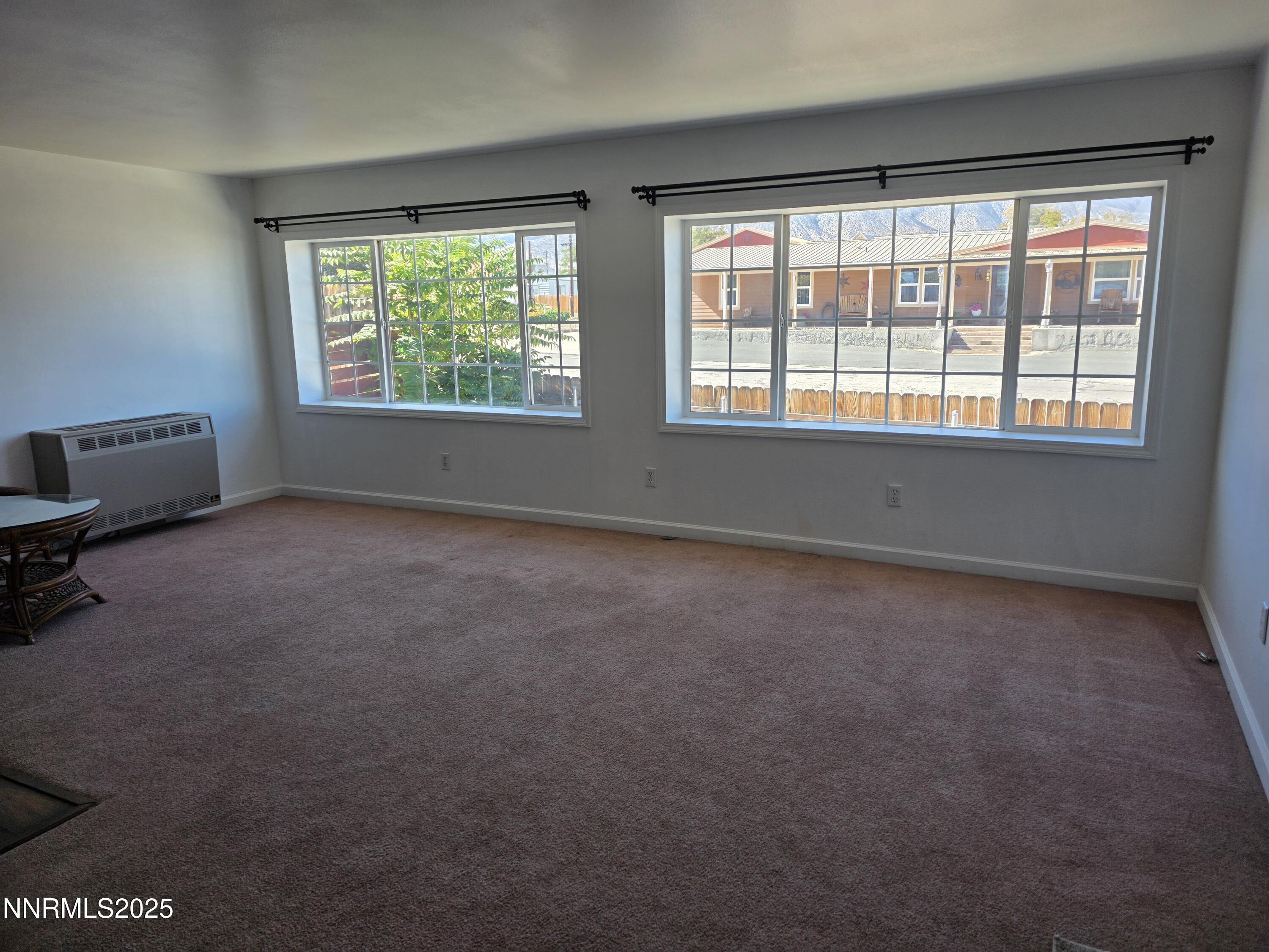 1110 4th Street Hawthorne, NV 89415 - Photo 6 of 27 an empty room with windows