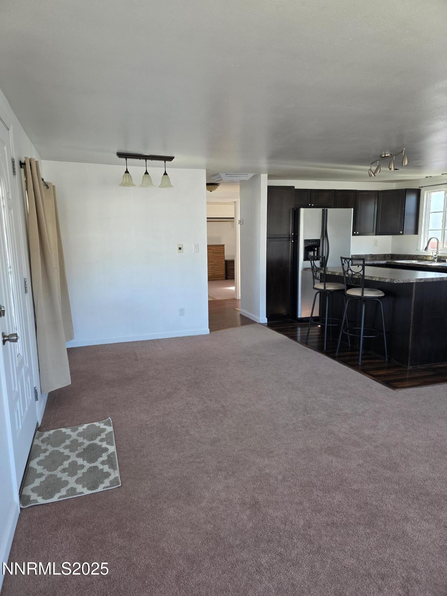 1110 4th Street Hawthorne, NV 89415 - Photo 7 of 27 a view of kitchen with furniture and refrigerator