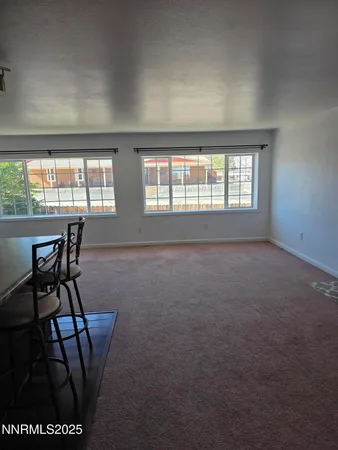 a workspace with furniture and window