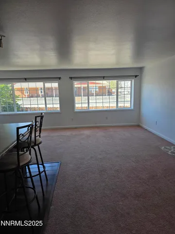 a workspace with furniture and window