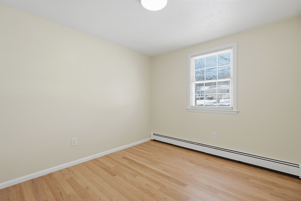 108 Cherry Street Framingham, MA 01701 - Photo 13 of 30 an empty room with a window