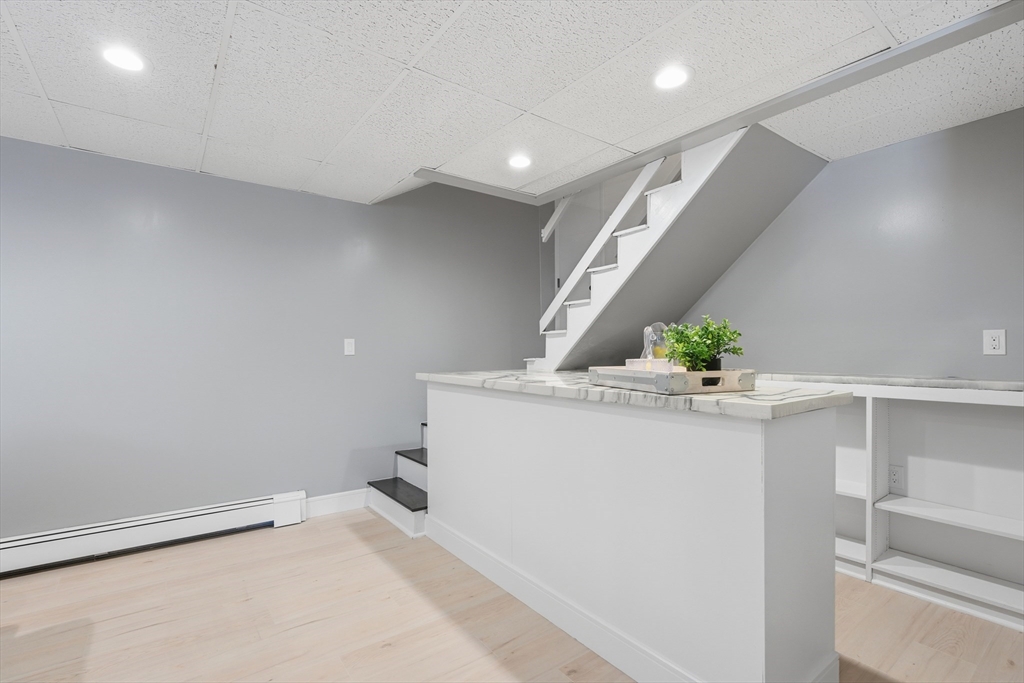 108 Cherry Street Framingham, MA 01701 - Photo 16 of 30 a hallway with stairs