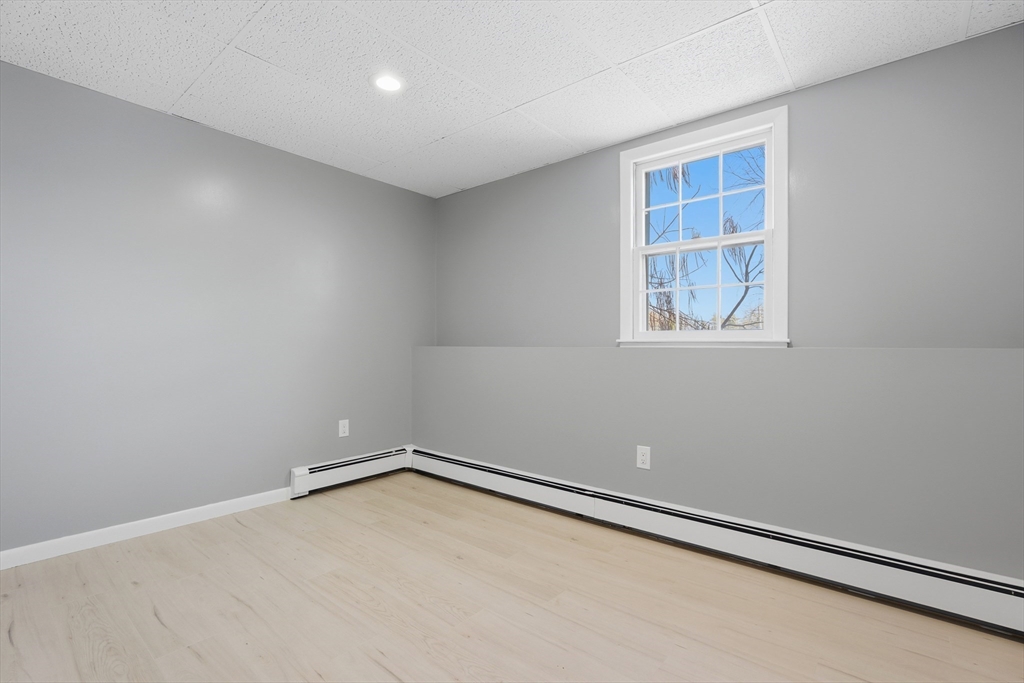 108 Cherry Street Framingham, MA 01701 - Photo 22 of 30 an empty room with windows