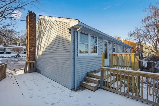 a view of backyard with deck