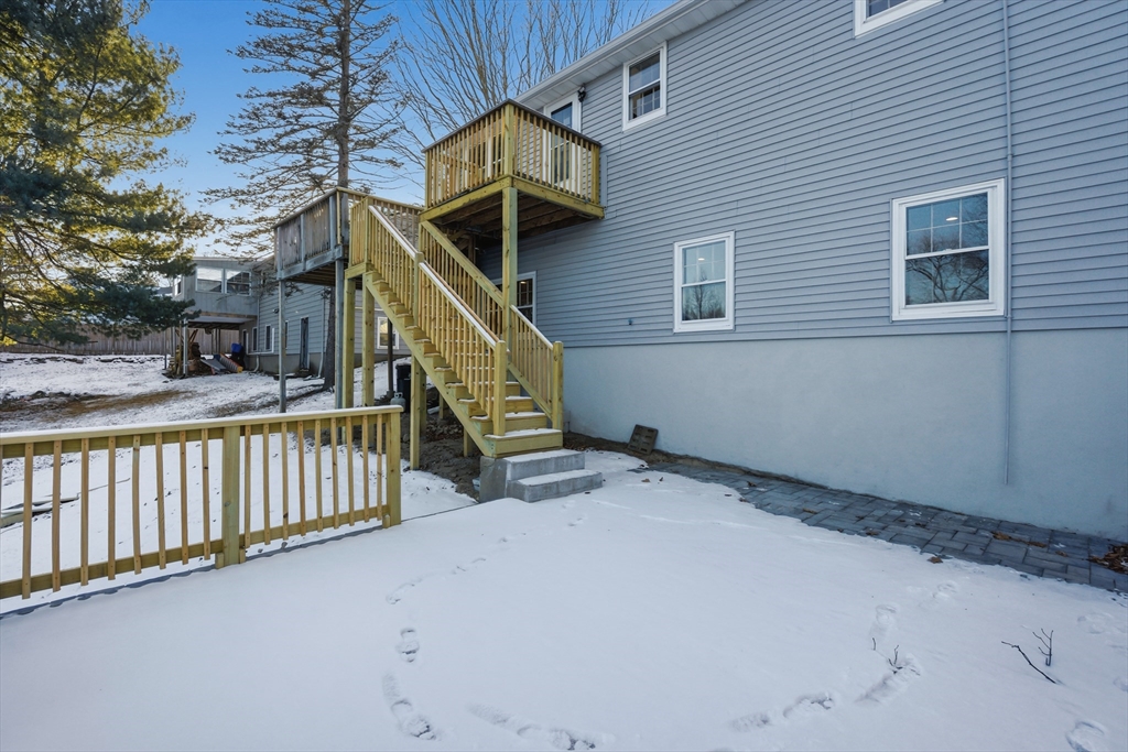 108 Cherry Street Framingham, MA 01701 - Photo 29 of 30 a view of backyard with deck and wooden floor