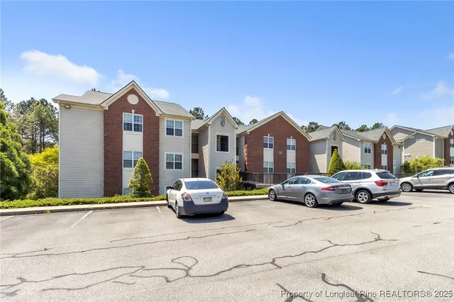 a car parked in front of a house