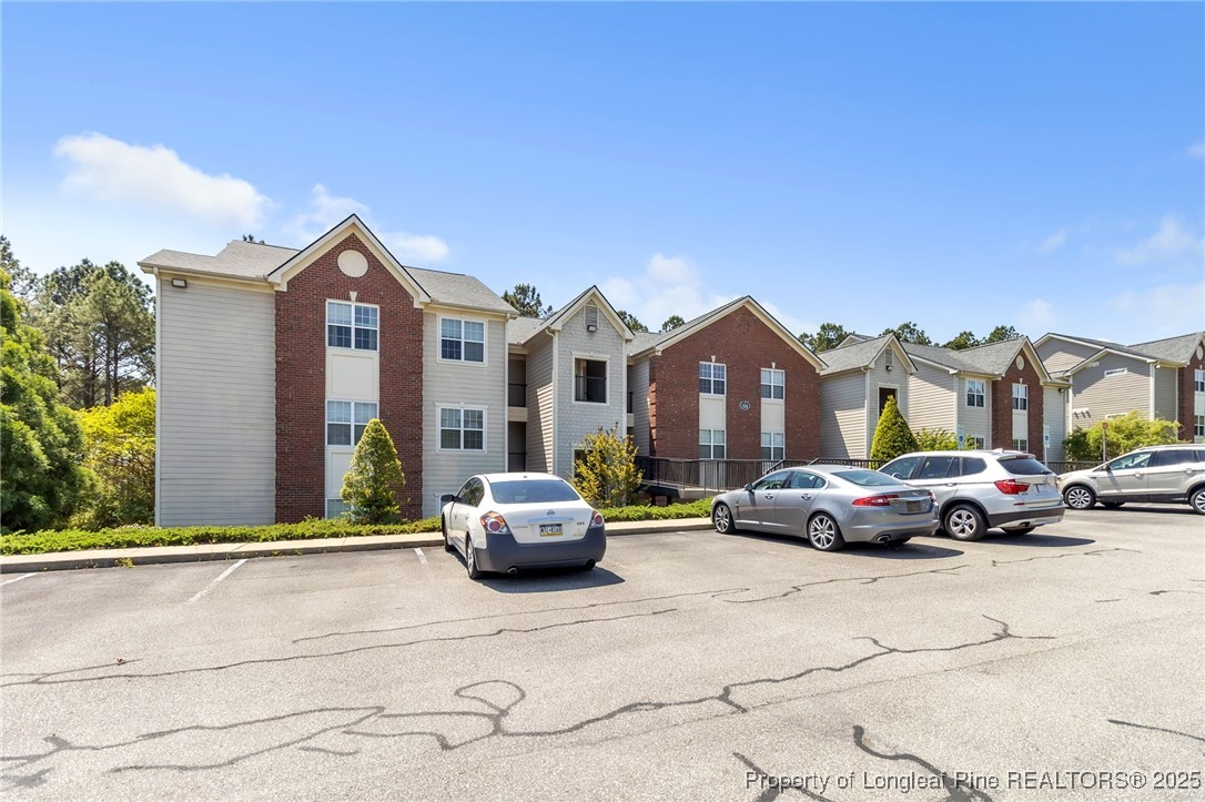 124 Gallery Drive, Unit 302 Spring Lake, NC 28390 - Photo 3 of 33 a car parked in front of a house
