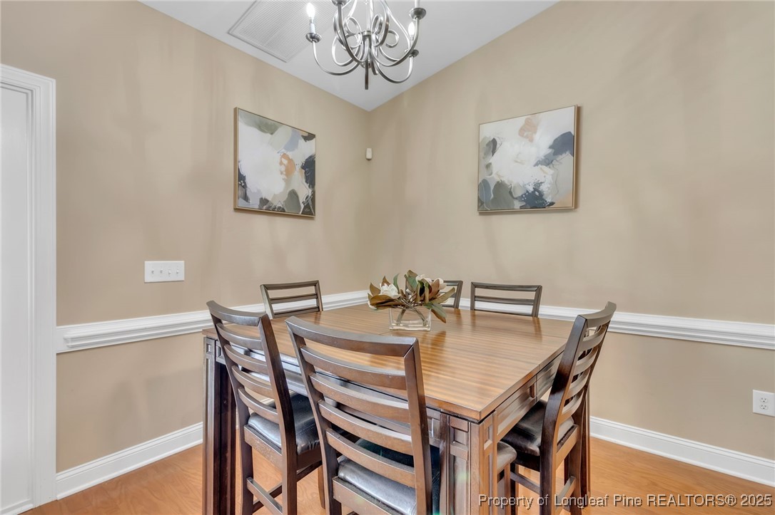 124 Gallery Drive, Unit 302 Spring Lake, NC 28390 - Photo 9 of 33 a view of a dining room with furniture