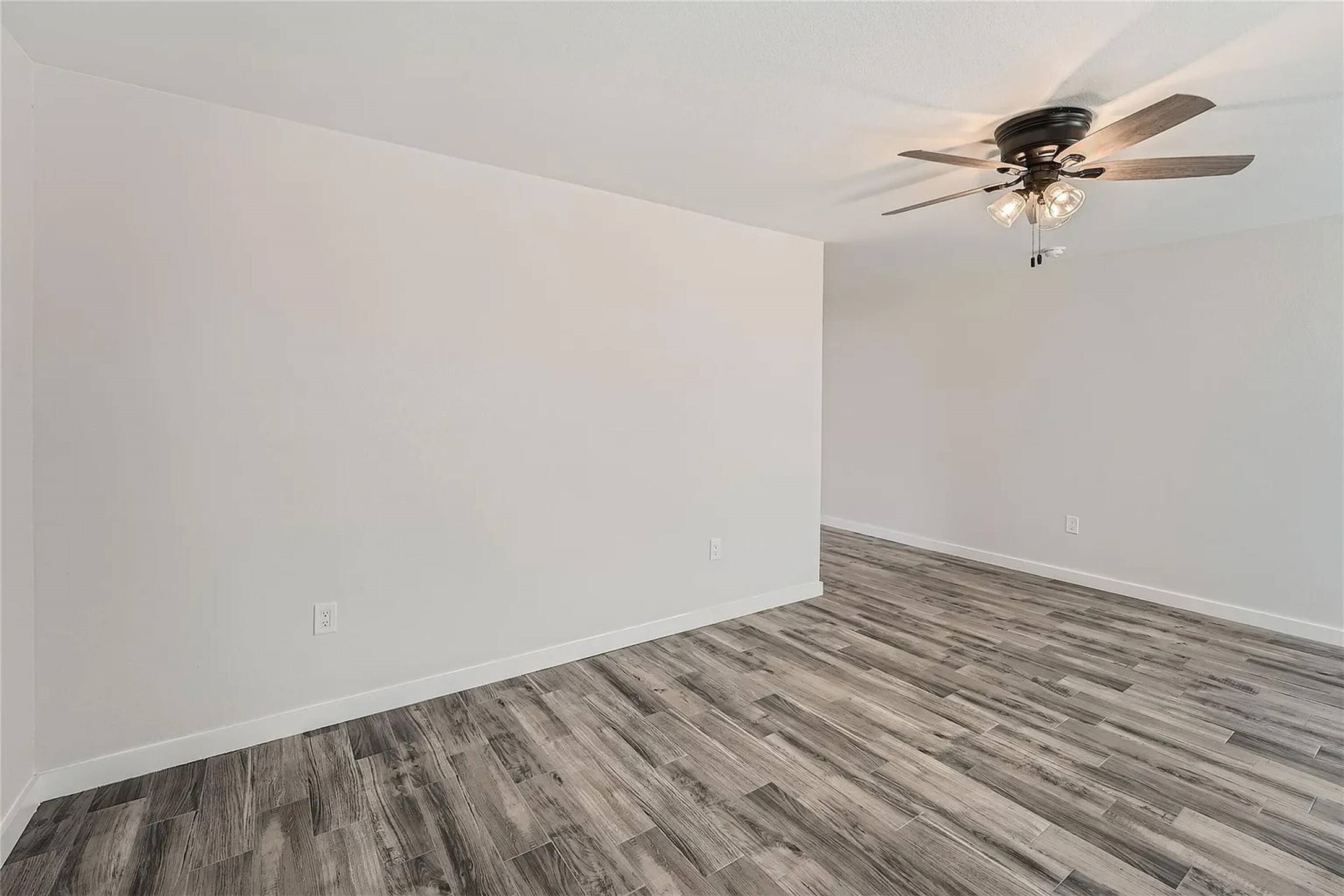 109 Fisher Street, Unit A & B Elgin, TX 78621 - Photo 7 of 9 a view of a room with wooden floor