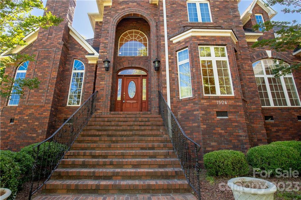 1504 Greyfox Estates Road Lancaster, SC 29720 - Photo 3 of 45 a view of a brick house with large windows