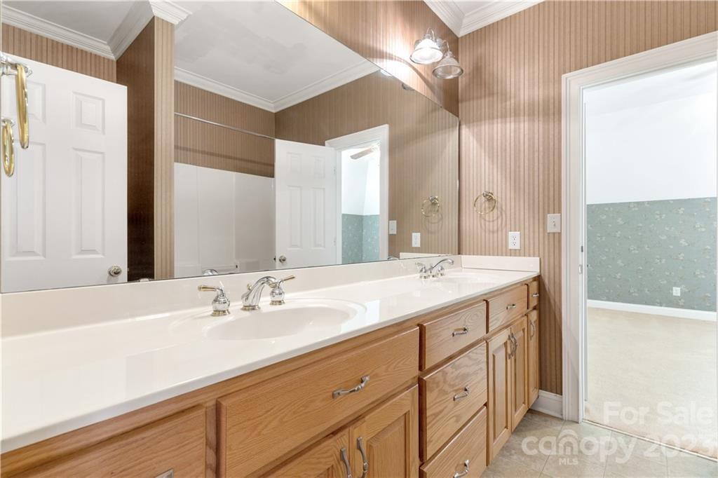 1504 Greyfox Estates Road Lancaster, SC 29720 - Photo 38 of 45 a bathroom with a sink double vanity and a mirror