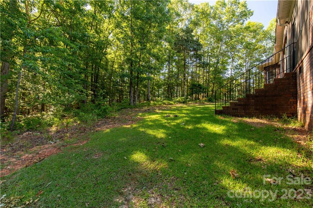 1504 Greyfox Estates Road Lancaster, SC 29720 - Photo 45 of 45 a view of a big yard with large trees
