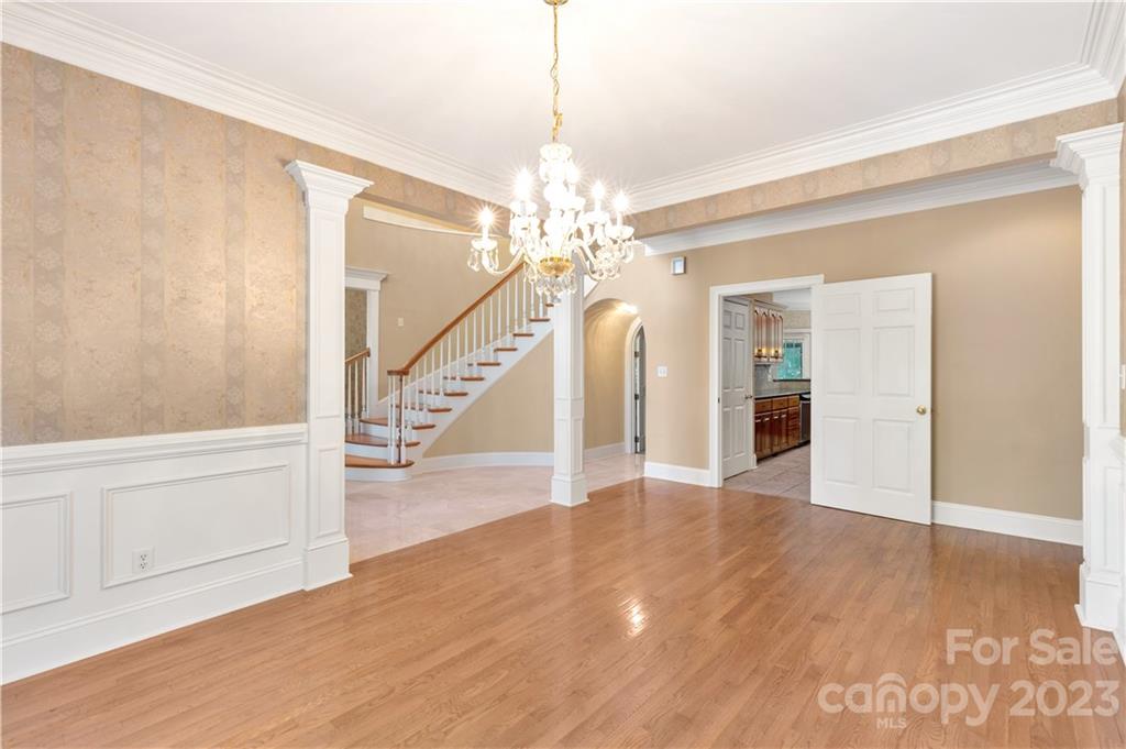 1504 Greyfox Estates Road Lancaster, SC 29720 - Photo 8 of 45 a view of a livingroom with wooden floor and stairs
